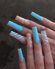 18. Crystal-Embellished Snowflake Nails Blue Winter Wonderland Nails, Christmas Nails Acrylic Blue, Winter Wonderland Nail Designs, Winter Wonderland Nails Acrylic, Snow Nails Winter Blue, Blue And Nude Nails, Turquoise Nail Ideas, Light Blue Christmas Nails, Winter Nails Long