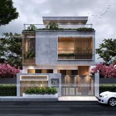 a white car is parked in front of a building with plants on the balconies