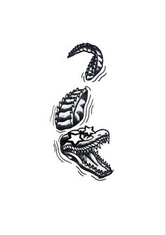 the letter s is made up of two alligators'heads and one crocodile's teeth