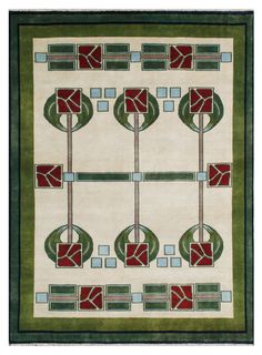 a rug with green, red and white designs on the bottom half is shown in front of an off - white background