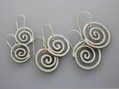 Spiral jewelry, silver jewelry- silver earrings, medium spiral earrings, swirls Spiral In Nature, Jewelry Silver Earrings, Spiral Jewelry, Mountain Earrings, Metal Pendant Necklace, Mountain Jewelry, Flagstaff Az, Swirl Earrings, Mixed Metal Jewelry