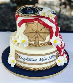 a cake decorated with flowers and an american flag