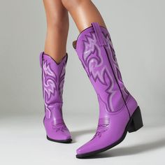 Material: Vegan Leather Color: Blue, Black, White, Purple, Fuchsia Season: 4 Seasons Heel Height: 2.36 inches (60 mm) Platform: No platform Toe Style: Square Toe Heel Style: Block Heel Style: Cowgirl Boots / Western Boots Closure Type: Slip-On HandcraftedUS sizing. Fits true to size.Please note that measurements may vary by size. Purple Snip Toe Boots For Fall, Purple High Heel Boots Medium Width, Purple Round Toe Boots For Spring, Trendy Purple Pointed Toe Boots, Fitted Western Purple Boots, Fitted Purple Western Boots, Purple Leather Spring Boots, Spring Purple Leather Boots, Purple High Heel Boots For Spring