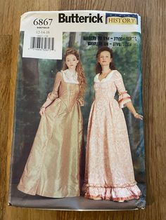 Original sewing pattern. Colonial costumes for women's  Envelope description: Lined, flared dress, floor-length, has close fitting, boned, interfaced bodice, princess seams, dropped waist, pleats, below elbow sleeves, back loop/lacing.  Women's size 6-8-10 Uncut factory folded. Envelope has slight sign of usage. Women's size 12, 14, 16 This pattern was cut, leaving all size available and meticulously folded back in. Please look at the pictures. The envelope has slight sign of usage.  Women's size 18-20-22 Uncut and factory folded. Envelope has slight sign of usage. The patterns I'm selling comes either from my mom's estate or from professional dress maker who took great care of their patterns.  If for any reasons you are not satisfied or if there is pieces missing I will gladly reimburse y Colonial Dress Pattern, America Dress, Colonial Dress, Historical Dress, Colonial America, Vintage Dress Patterns, Butterick Pattern, Flared Dress, Princess Seams