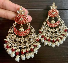 Maroon Polki Kundan Chandbali Earrings. Light Weight Earrings. Handcrafted pair of earrings. Gives a traditional look. Can be worn for engagement and wedding parties. Indulge in it or gift it and watch the compliments flow! It is advisable to store jewelry in a zip lock pouch (air tight pouch), keep away from water perfume and other chemicals and clean it with soft cloth. FREE SHIPPING!! Red Jhumka, Punjabi Earrings, Kundan Chandbali, Kundan Jhumka, Pakistani Earrings, Water Perfume, Chandbali Earrings, Earrings Indian, Store Jewelry