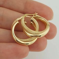 Real 14k Yellow Gold Fancy Frosted Double Hoop Earring 21mm Gift For Mom Christmas Gift * Comes as a pair. * The product is made of 100% 14k Solid Gold and it has a 14K or 585 stamp on item. * The package includes a gold certificate. * Every package comes in a gift box. * Ships from a small business inTurkey 14k gold does not oxidize or discolor, so you can wear your jewelry every day, anywhere! Gold Hoop Earrings Stamped 14k For Gift, Gold Hoop Earrings Stamped 14k As Gift, Gold 14k Stamped Hoop Earrings As Gift, 14k Stamped Huggie Earrings For Anniversary, Small Hoop Huggie Earrings Stamped 14k For Gift, 14k Huggie Earrings For Anniversary, Stamped 14k Small Hoop Huggie Earrings For Gift, Hallmarked Hoop Huggie Earrings For Gift, Gift Hallmarked Hoop Huggie Earrings