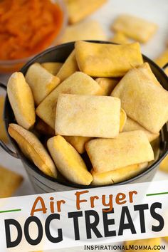 an air fryer filled with dog treats on top of a table