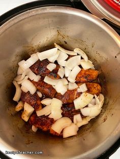 the food is being cooked in the pot on the stove top and ready to be eaten