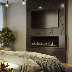 a bedroom with a bed and a fireplace in the wall next to a large window