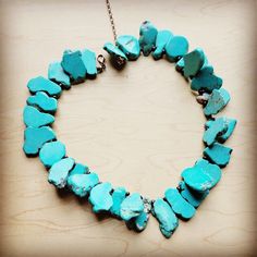 Blue Turquoise Slab stone necklace is a great addition toyour boho wardrobe! Dress up any outfit to add a little western flair.Turquoise in this necklace is a dyed stone and will vary in shades of blue.Stones will vary in size from 1/2" to 1"Measures 18" in length plus a 2" extender Although your item will resemble the photo,each piece is created by hand, so no two are identical. Boho Wardrobe, Boho Turquoise, Tech Jewelry, Leather Store, Estilo Boho Chic, Turquoise Boho, Blue Stones, African Turquoise, Hair Accessories Gift