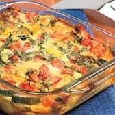 a casserole dish on a blue place mat