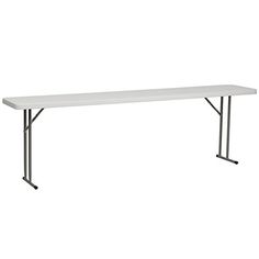 a white table sitting on top of a metal frame