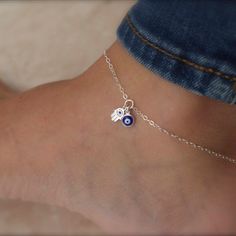 Tiny hamsa and evil eye anklet DE T A I L S ✦available in silver, gold and rose gold with blue eye or white eye ✦evil eye charms are reversible ✦eye size: 5mm ✦hamsa hand: 5x7mm charm features a tiny blue cz stone L E N G T H ✦choose the length you need from the drop down menu M A T E R I A L ✦ silver: all components are 925 solid sterling silver. ✦gold: chain and findings are 14K gold-filled and charms are gold vermeil ✦ rose gold: chain and findings are 14K rose gold-filled and charms are rose Evil Eye Anklet, Tiny Charms, Hamsa Evil Eye, Protective Charms, Evil Eye Hamsa, Car Charms Mirror, Evil Eye Protection, Tiny Charm, Indian Jewellery Design