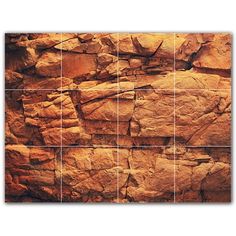 the rocks are arranged in squares to create a unique wall art piece that can be used as a backdrop or display