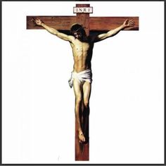 the crucifix is painted with white paint and has a cross on it