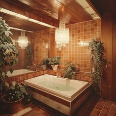 a bath tub sitting next to a plant in a bathroom