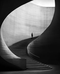 a man standing on top of a set of stairs