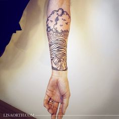 a person with a tattoo on their arm