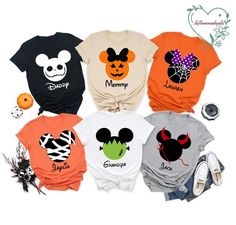 four different shirts with mickey mouse and minnie mouse heads on them, one is orange, the