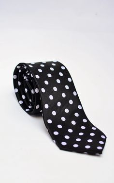 Knightsbridge Neckwear Polka Dot Silk Tie - Black / White From Woven Durham Elegant Black Summer Ties, Black Summer Business Ties, Black Ties For Spring, Black Tie For Spring, Elegant Polka Dot Ties, Black Summer Formal Ties, Adjustable Black Tie For Office, Classic Polka Dot Ties For Business, Classic Black Ties