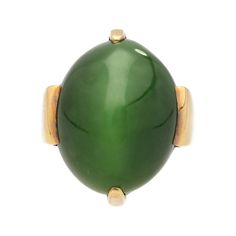 Cats Eye Gump Signed Ring in 14K Yellow Gold .  Invest in luxury with this vintage Gump signed dome solitaire ring, featuring a vivid green Cats Eye , shaped into an oval cabochon, and secured with a 4-prong setting. Crafted from 14K yellow gold, this ring features a geometric shape to its shank and base.   Item Details: - Type: Vintage Dome Ring  - Metal: 14K Yellow Gold  - Weight: 18.04 Grams  - Setting: Prong  _______________________  Center Stone Details: - Type: Cats Eye   - Cut: Cabochon, Heirloom Green Emerald Oval Cabochon Ring, Heirloom Green Oval Cabochon Emerald Ring, Elegant Domed Emerald Ring, Heirloom Green Oval Cabochon Rings, Green Oval Dome Ring For Formal Occasions, Classic Green Cabochon Ring, Green Oval Heirloom Signet Ring, Elegant Green Domed Rings, Luxury Green Domed Ring