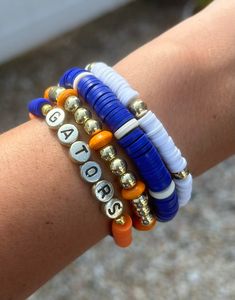 "University of Florida Gators bracelet stack. Measures 7\", if you need a different size please message me and let me know!" Florida Gators Bracelet, Florida University, Trunk Party, Uf Gators, Cup Charms, Team Bracelets, Inspired Bracelets, Gameday Outfits, Chomp Chomp