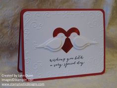 a card with two white birds on it and the words wishing you love is very special day