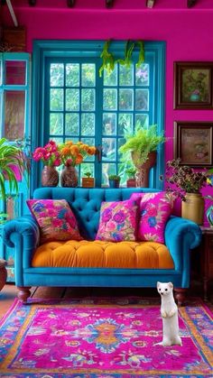 a living room filled with colorful furniture and lots of potted plants on the windowsill