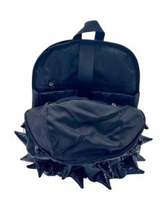 Black Out black backpack is your ticket to making an unforgettable statement. This black backpack's bold spike design and faux reptile texture commands attention and exudes confidence that sets you apart from the crowd. EXTERIOR Dimensions: 18" x 14" x 8" • Two zipper side pockets • Ergonomic mesh extra back padding • Adjustable Straps with chest strap for custom sizing • Heavy duty zippers with metal hardware • Top loop for hanging INTERIOR Padded laptop compartment protects electronics • Fits Edgy Standard Backpack For Everyday Use, Edgy Travel Backpack, Edgy Standard Backpack For Travel, Punk Backpack With Zipper Closure For Everyday Use, Punk Style Backpack With Zipper For Everyday Use, Punk Style Standard Backpack For Streetwear, Punk Style Backpack, Punk Streetwear Standard Backpack, Punk Style Streetwear Standard Backpack