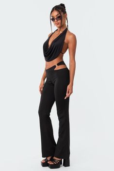 Halter Top Cropped fit Cowl neck Open-back design Two piece item Polyester, Spandex Model wears size S Model height is 5'7 Item care: Wash with similar color Halter Tops Outfit, Low Cut Jeans, Cutout Pants, Open Back Crop Top, Vegas Outfit, Low Cut Top, Flared Leggings, Swimwear Dress, Top Cropped