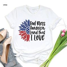 a t - shirt with the words god bless america and that i love