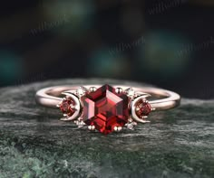 - Metal: Solid gold(10K/14K/18K white/yellow/rose gold),925 sterling silver,platinum available- Main Stone: 6x6mm hexagon cut natural red garnet- Accent Stone: red garnets and moissanites- Can be personalized: Yes Rose Gold Garnet Gemstone Ring, Red And Gold Ring, Art Deco Moon, Nature Inspired Wedding Ring, Garnet Stone Ring, Red Gemstone Ring, January Birthstone Rings, Garnet Engagement Ring, Red Stone Ring