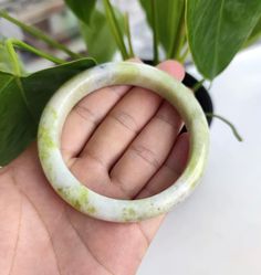 Serpentine is a new jade in the gemstone market. Serpentine is known as xiu jade or Korean jade in the Asian culture. Inner Diameter: 63mm Gemstone: 100% Serpentine(Untreated) Note: Certificate of Authenticity Included (Size Selection) *Small Bangle Inner Diameter: 54-58mm(Palm Width: 65-72mm) *Medium Bangle Inner Diameter:58-61mm(Palm Width: 72-79mm) *Large Bangle Inner Diameter: 61-65mm(Palm Width: 79-86mm) *Large Bangle Inner Diameter: 65-68mm(Palm Width: 86-93mm) If you have any questions or Asian Culture, Jade Bangle, Green Jade, Jade Green, Stone Color, Halloween Shopping, Hong Kong, Bangle Bracelets, Two Tone