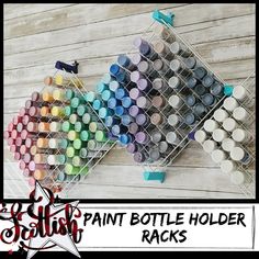 the paint bottle holder racks are organized and ready to be used for crafting or painting