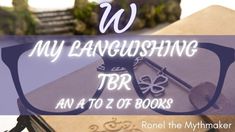 a pair of glasses sitting on top of a book with the words, my laughing tbr an at to z of books