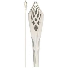 a white plastic object with a long stick sticking out of it's center and an intricate design on the top