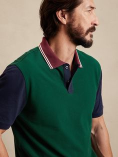 Green Cotton Short Sleeve Polo Sweater, Green Cotton Sporty Polo Shirt, Green Sporty Cotton Polo Shirt, Sporty Color Block Cotton Polo Shirt, Sporty Green Cotton Polo Shirt, Green Polo Shirt With Striped Collar And Short Sleeves, Green Cotton Polo Shirt With Ribbed Collar, Cotton Polo Sweater With Contrast Stripes, Green Short Sleeve Polo Shirt With Striped Collar