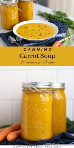 two jars filled with carrot soup sitting on top of a table next to carrots