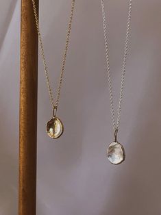 This is the Aurora pendant 🌒 Handcrafted using sustainable Australian 9ct gold, finished with a handmade bail. Part of the Aurora Collection, named after the goddess of dawn as an embodiment of new beginnings, celebrating the arrival of light after darkness ✨ This special piece provides solace and timeless elegance with its gentle concave shape perfect for tactile feedback, and its curves reminiscent of the sun and the moon Personalise with up to 3 initials for yourself or your special human (s Light After Darkness, Goddess Of Dawn, The Sun And The Moon, Sun And The Moon, Australian Gold, Long Necklaces, Solid Gold Chains, The Aurora, Personalized Pendant