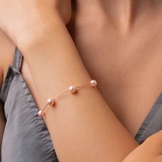 Introducing our Pink Pearl Bracelet - a delicate accessory that exudes elegance and grace. Adorned with lustrous pink freshwater pearls, this handcrafted bracelet is a perfect blend of sophistication and charm. Elevate your style with this timeless piece, whether it's for a formal event or a casual outing. Embrace the allure of pink pearls and add a touch of feminine beauty to any ensemble. ► Elegant Handmade Pink Pearl Bracelet * Material: 925 Sterling Silver and High Quality 14k Solid Gold * P Elegant Pink Hypoallergenic Bracelet, Elegant Pink Chain Bracelet, Elegant Pink Hypoallergenic Charm Bracelet, Elegant Hypoallergenic Rose Gold Bracelets, Dainty Pearl Bracelet, Bridal Jewelry Pearl Sets, Handmade Pearl Necklace, Chunky Pearl Necklace, Pink Pearl Bracelet