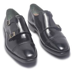 Monk strap shoes for men are one of a kind. Created with a heightened semblance of superior leather and black monk strap finish, it is a pair for everyday wear and is perfect for all occasions. Their appeal lies in their ability to balance the fine line between formal and nonchalant at the same time. In case, at a gathering, you are required to dress sharply but don’t want to look too formal, slip into these shoes. This footwear does not have laces, unlike the traditional lace-up formal shoes. Leather Skin shop’s strapped dress boots are created with extensive attention to detail and are a smart addition to any professional’s closet. With a 6-inch shaft height and a rubber outsole tapped at the back, you can pair these shoes with your formal trousers and shirt to show off your style statem Black Monk Strap Shoes With Brogue Detailing For Galas, Black Monk Strap Shoes With Leather Sole, Classic Black Monk Strap Shoes With Brogue Detailing, Classic Black Monk Strap Shoes With Leather Sole, Formal Black Monk Strap Shoes With Rubber Sole, Black Monk Strap Shoes For Semi-formal Occasions, Black Monk Strap Shoes For Semi-formal Events, Black Closed Toe Monk Strap Shoes For Semi-formal, Formal Black Monk Strap Shoes With Leather Sole