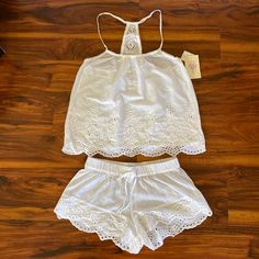 Description In Bloom By Jonquil Eyelet Cotton Short Pajamas Cropped Two Piece Set In White. Size X-Small. - 100% Cotton - Machine Wash Cold - Gentle Cycle With Like Colours - Use Only Non Chlorine - Bleach When Needed - Rumble Dry Low - Delicate Cycle - Iron At Lowest Setting - Sar041 - Embroidered Cami & Shorts Pj Set - Lightweight Non-Stretch Woven Fabric - Intimates, Sleepwear, Pajamas, 2 Piece Set, Tank, Adjustable Straps, Elasticate Waistband, Eyelet, Scalloped Hem, Pull On Fitted Cotton Sets For Relaxation, White Summer Pajama Party Set, Fitted Summer Sleepwear For Relaxation, White Casual Sets With Lace Trim, Stretch Vacation Sets With Shorts, Stretch Short Sets For Vacation, White Lace Trim Sleepwear For Relaxation, White Sleepwear Sets, Short, White Short Sleepwear Sets