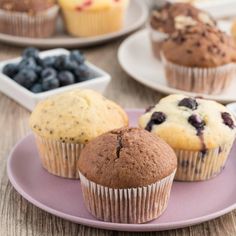 several different types of muffins are on the plate and ready to be eaten