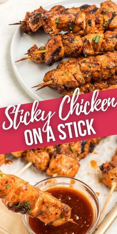 chicken skewers on a stick with dipping sauce