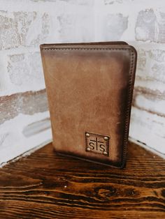 Elevate your everyday look with this dark brown, leather magnetic wallet. Featuring a strong magnetic closure, it's perfect to keep your cards and cash safe. . Stay stylish and organize with this leather wallet. STS Ranchwear Brown Trifold Wallet With Leather Patch For Everyday, Brown Trifold Wallet With Leather Patch, Brown Leather Patch Trifold Wallet For Everyday, Everyday Brown Trifold Wallet With Leather Patch, Brown Travel Wallets With Magnetic Closure, Distressed Brown Bifold Wallet For Everyday Use, Brown Wallets With Rfid Blocking For Everyday Carry, Brown Trifold Wallet With Rfid Blocking For Everyday Carry, Brown Rfid Blocking Wallets For Everyday Carry