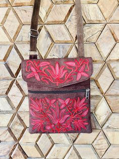 This  practical  and cute shoulder/crossbody boho bag with beautiful floral embroidery is the best solution for storing of mobile phone and  all the valuables and other personal items. It features 3 spaces for safe and practical storage of all we need, from which one zippered. It has a shoulder/ crossbody adjustable cord and it closes with a clip. The size is 23 cm height x 19 cm length. Perfect for trips, parties and everyday use.  PLEASE CHECK OUR COMPLETE COLOR COLLECTION. The photos are an estimate of the actual colours. Sometimes these colours are difficult to identify and describe -- we are presenting them depending on the lighting and the quality of your computer monitor. Bohemian Rectangular Shoulder Bag With Floral Embroidery, Artisan Brown Embroidered Shoulder Bag, Red Embroidered Bohemian Shoulder Bag, Leather Shoulder Bag With Floral Embroidery, Bohemian Embroidered Leather Shoulder Bag, Boho Girl, Boho Bag, Color Collection, Floral Embroidery