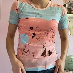 Unique Adorable Sheer Medium Sized Top With Graphic Design On It. From The Brand Lady Oh. Small Hole In The Armpit But Barely Noticeable. Never Worn By Me :( Adorable Pastel Colors. Can Fit A Small As Well. Graphic Design Color, Design Color, Blue Fashion, Pastel Colors, Medium Size, Pink Ladies, Color Design, Pastel, Tops & Tees