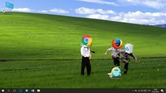 three people in the middle of a field with google logo on their heads