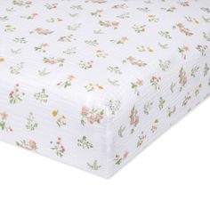 a white sheet with flowers on it