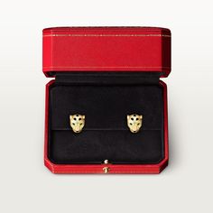 Boucles d'oreilles Panthère de Cartier, or jaune 750/1000, laque noire, serties chacune de grenats tsavorites et d'onyx. Cartier Earrings Panther, Cartier Panthere Earrings, Cartier